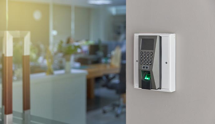 Biometric fingerprint and keypad access control system for secure building entry