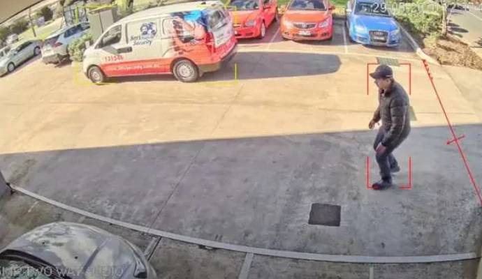 Security camera monitoring parking lot activity.