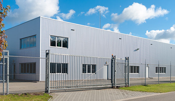 Iron gated fence at warehouse