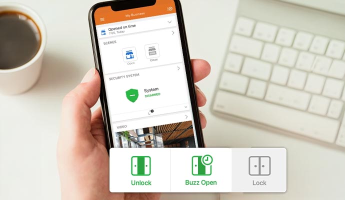 Smartphone app showing remote door unlock, lock, and entry management controls