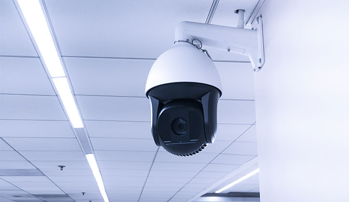 Wall mounted PTZ camera on drop ceiling